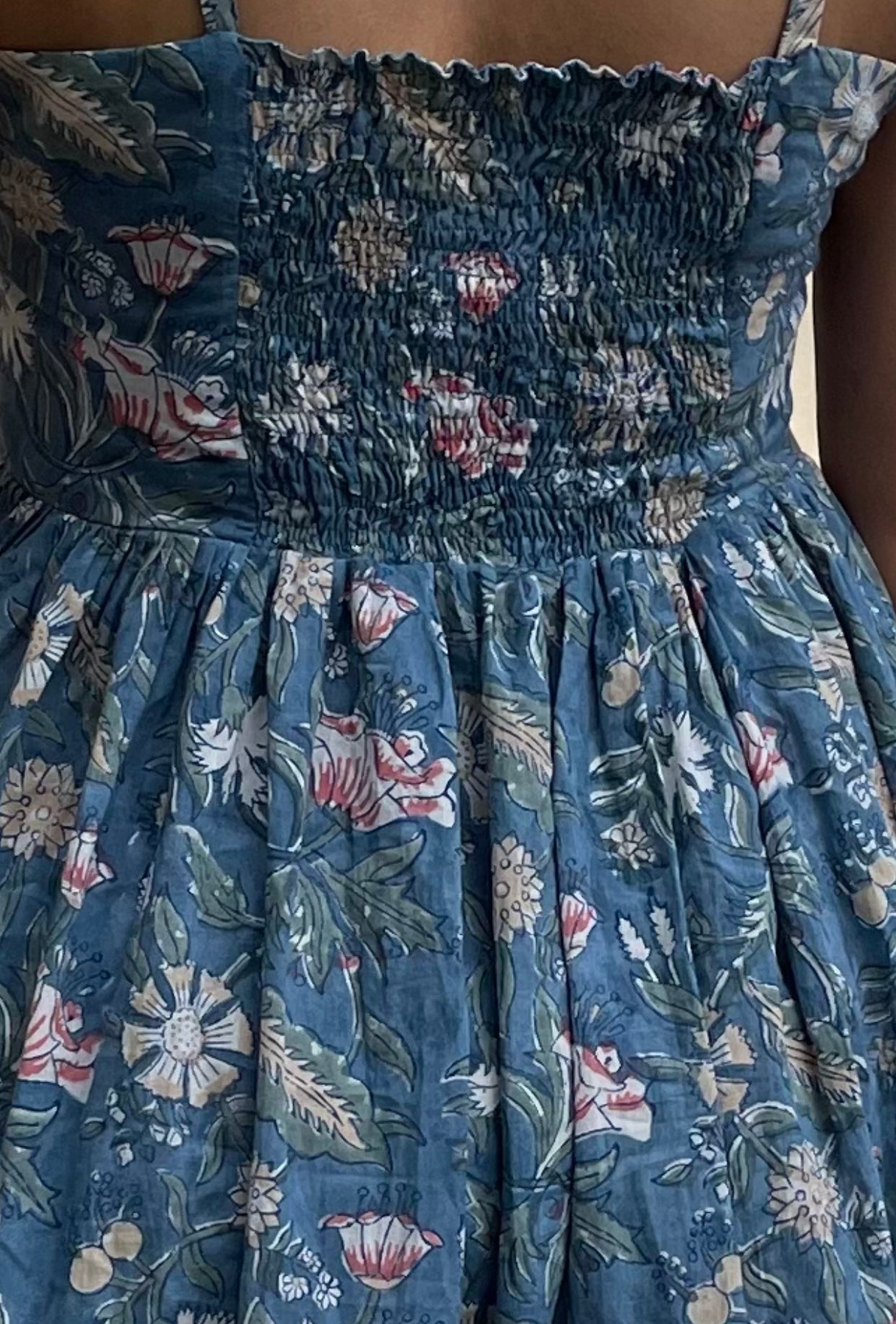 Shop our cotton maxi sundresses! Handcrafted, hand-block printed, with adjustable straps, smocked back, side slit, and pocket. Cool and stylish for summer. Elastic smocking at the back.