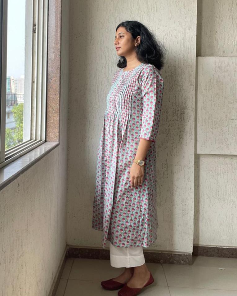 Authentic hand block printed cotton kurtis for summer online. Explore vibrant turquoise and pink designs, perfect for a stylish and comfortable summer wardrobe.