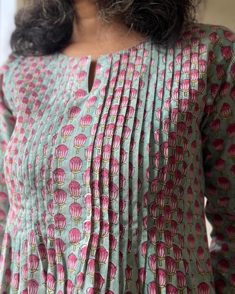 Authentic hand block printed cotton kurtis for summer online. Explore vibrant turquoise and pink designs, perfect for a stylish and comfortable summer wardrobe.