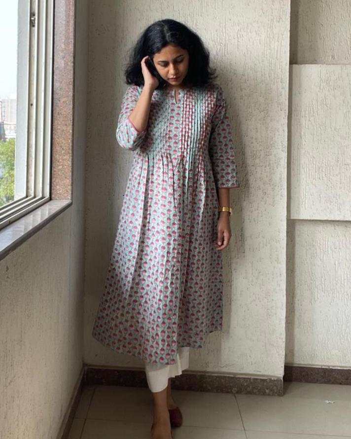 Authentic hand block printed cotton kurtis for summer online. Explore vibrant turquoise and pink designs, perfect for a stylish and comfortable summer wardrobe.