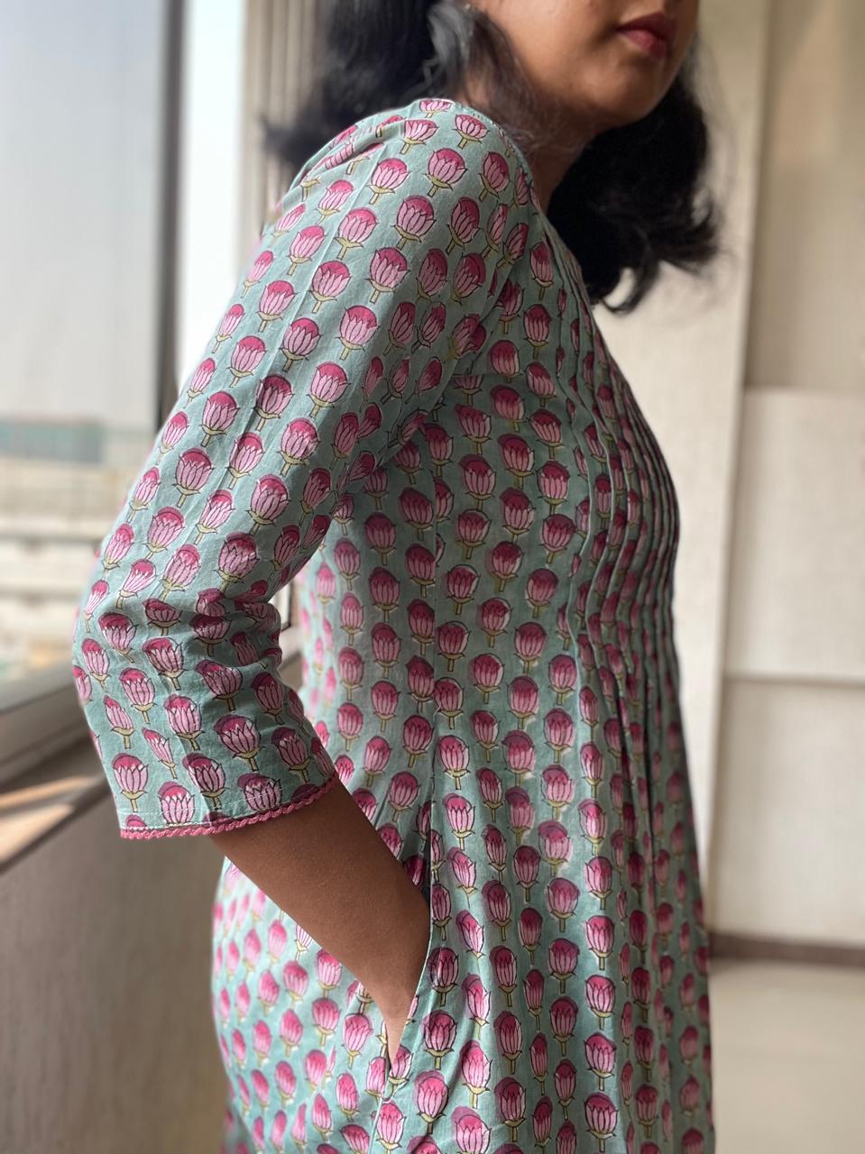 Authentic hand block printed cotton kurtis for summer online. Explore vibrant turquoise and pink designs, perfect for a stylish and comfortable summer wardrobe.