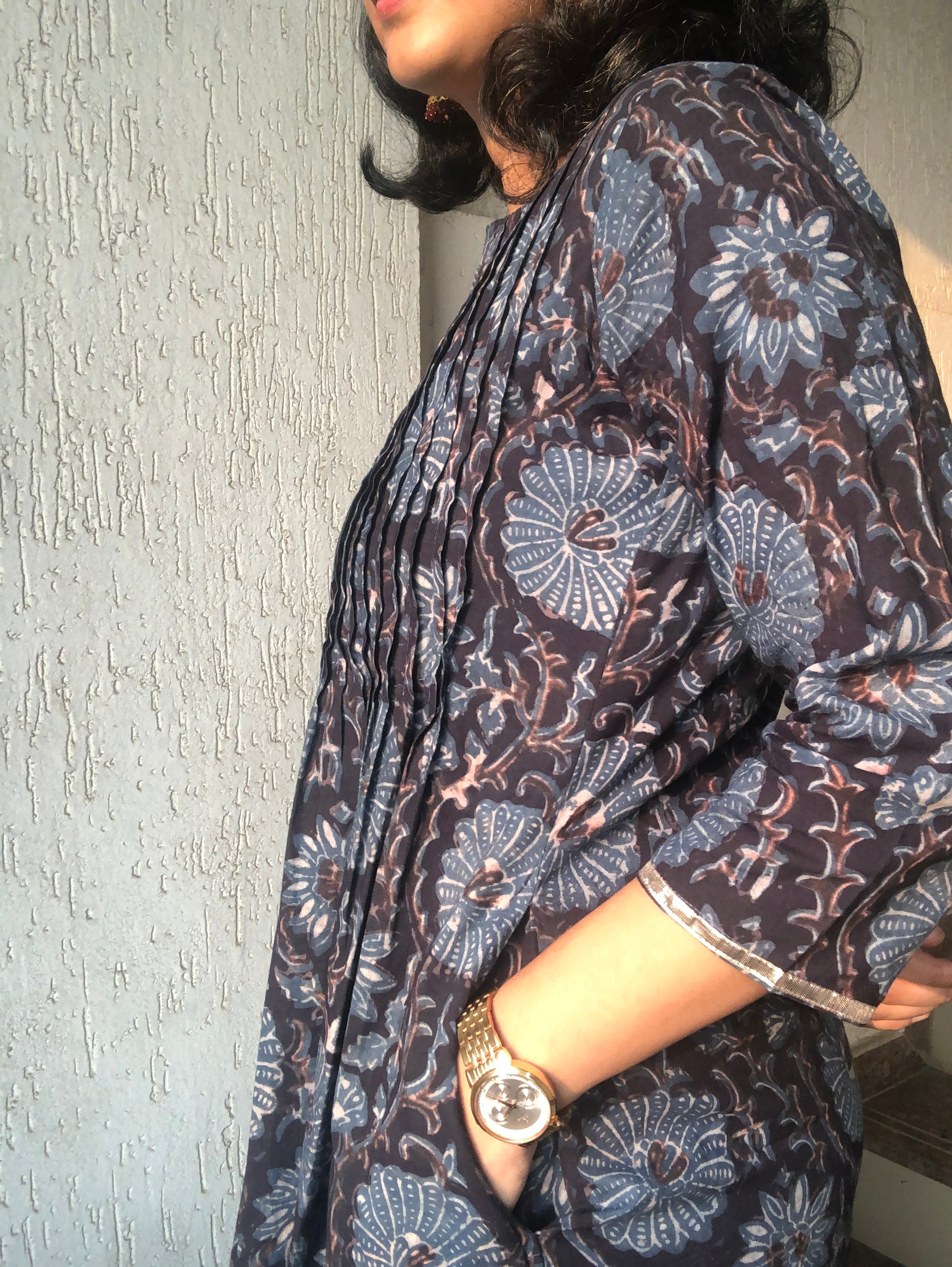 Black ajrakh cotton kurta for women with pintuck detailing on the front and 3/4th sleeves.