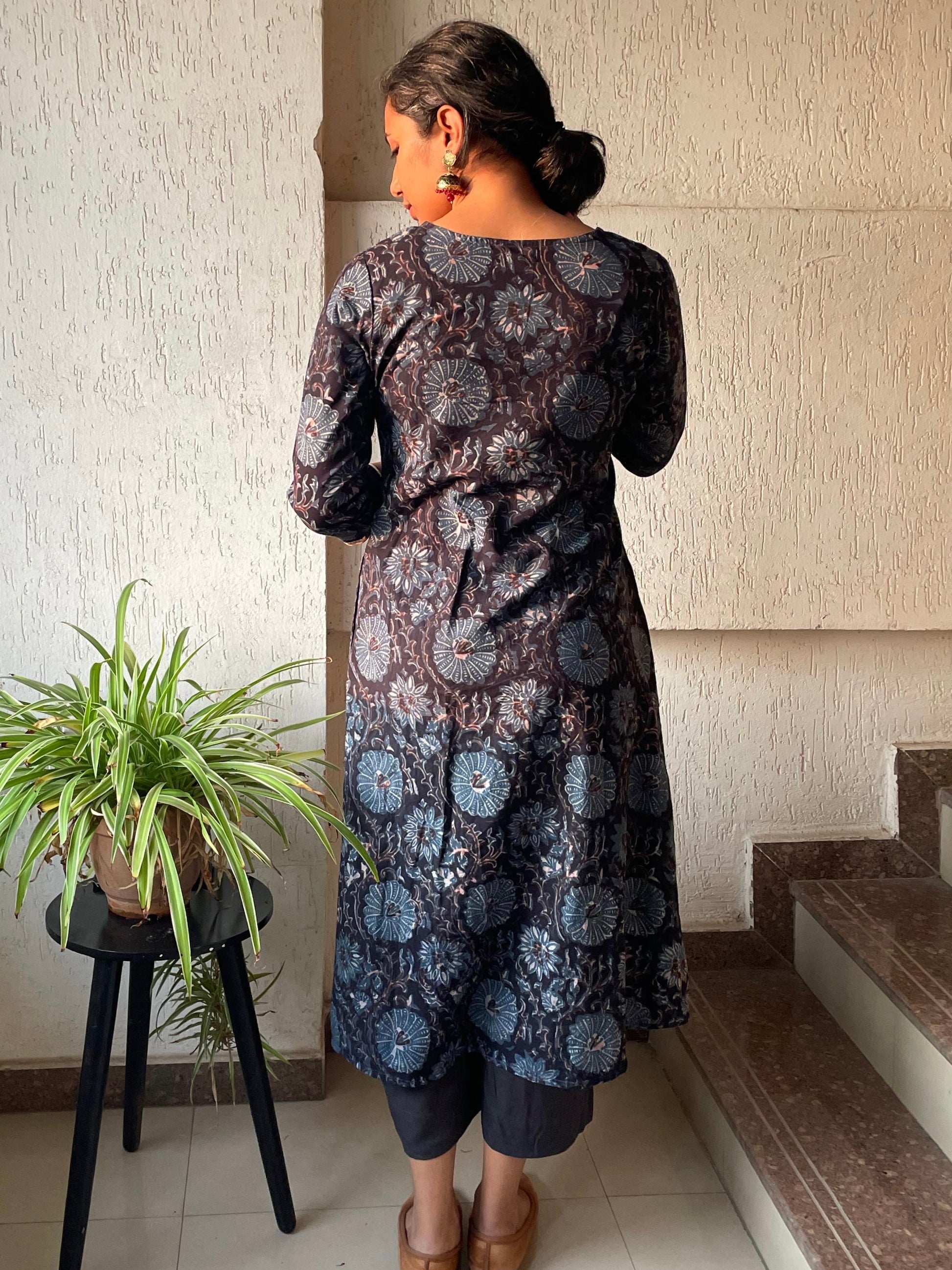Black ajrakh cotton kurta for women with pintuck detailing on the front and 3/4th sleeves.