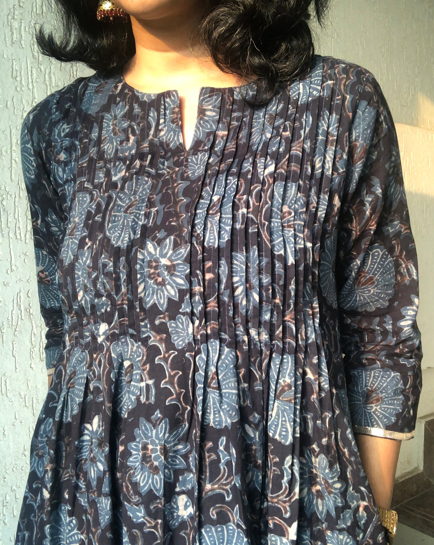 Black ajrakh cotton kurta for women with pintuck detailing on the front and 3/4th sleeves.