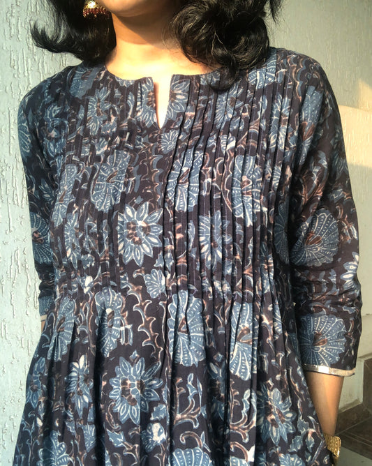 Black ajrakh cotton kurta for women with pintuck detailing on the front and 3/4th sleeves.