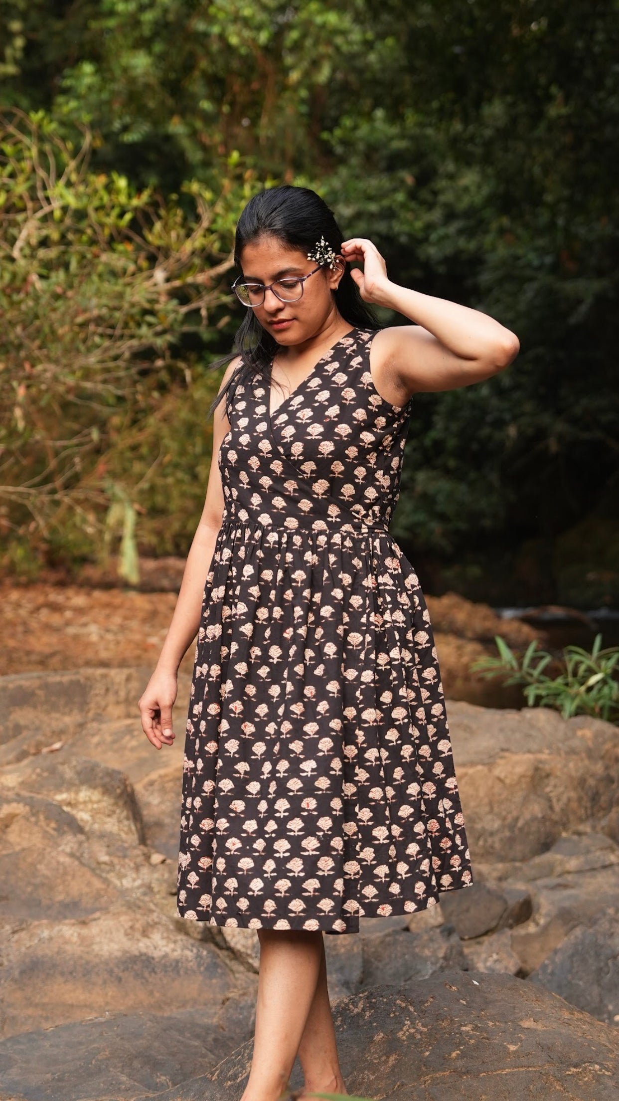 Experience the handcrafted charm of our cotton hand block printed black wrap dress. Enjoy the soft, breathable comfort of cotton with a stylish wrap design. Shop now!
