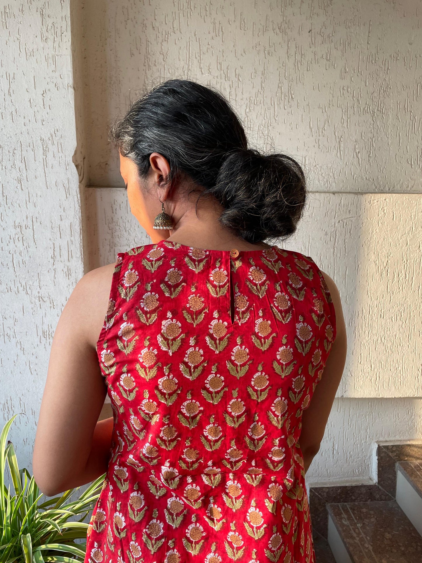 red hand block print cotton kurta. sleeveless with round halter neck.