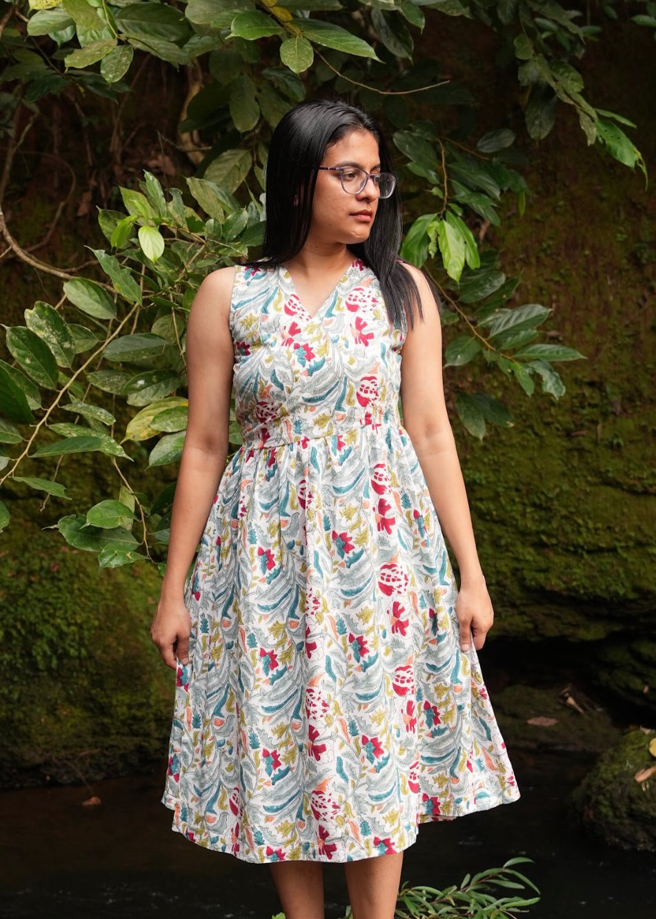 White floral cotton sleeveless wrap dress for women.