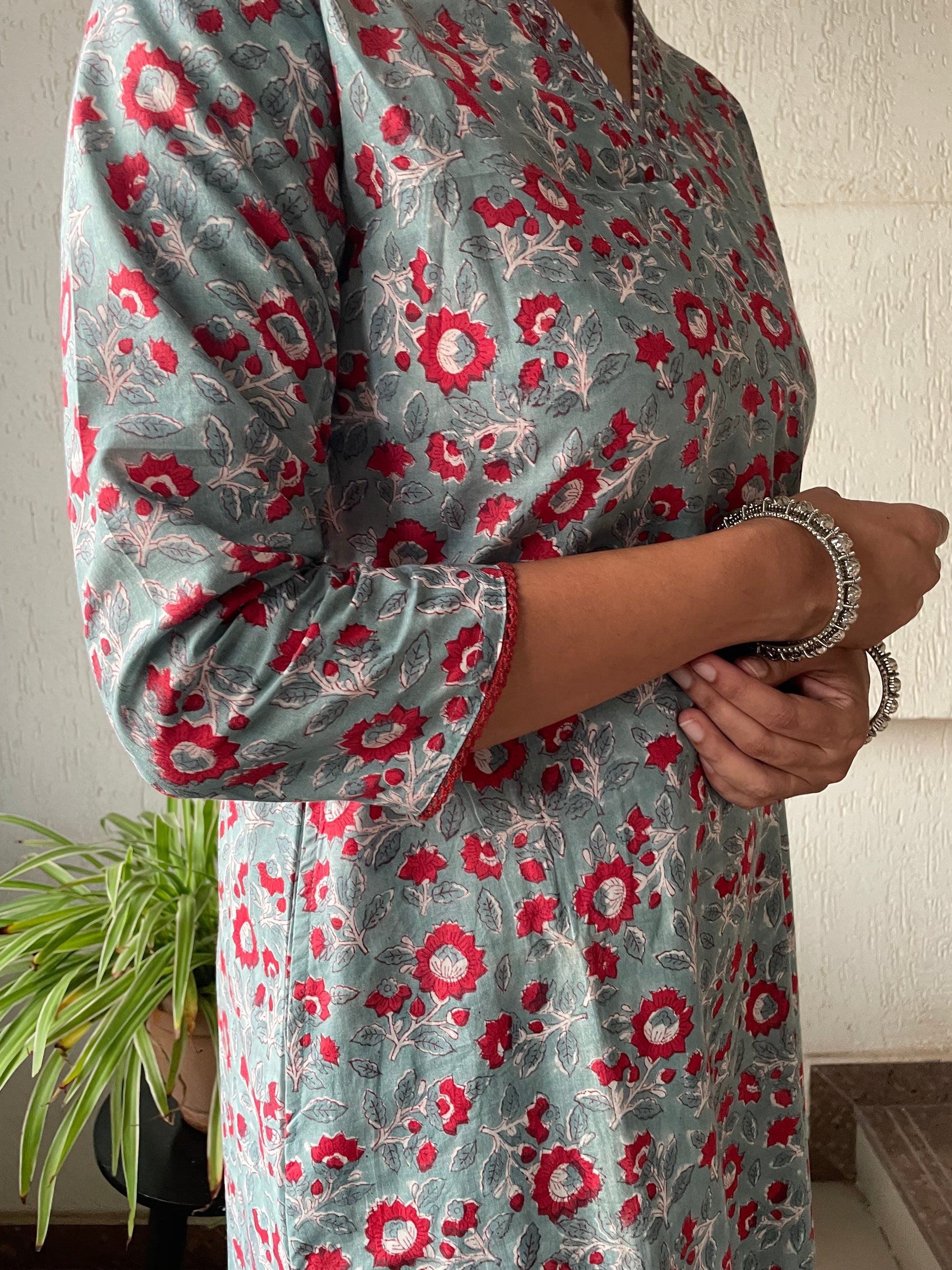 Find your perfect simple cotton long kurti online. Shop comfortable, hand block printed designs, including our stylish grey and red floral women's kurta.