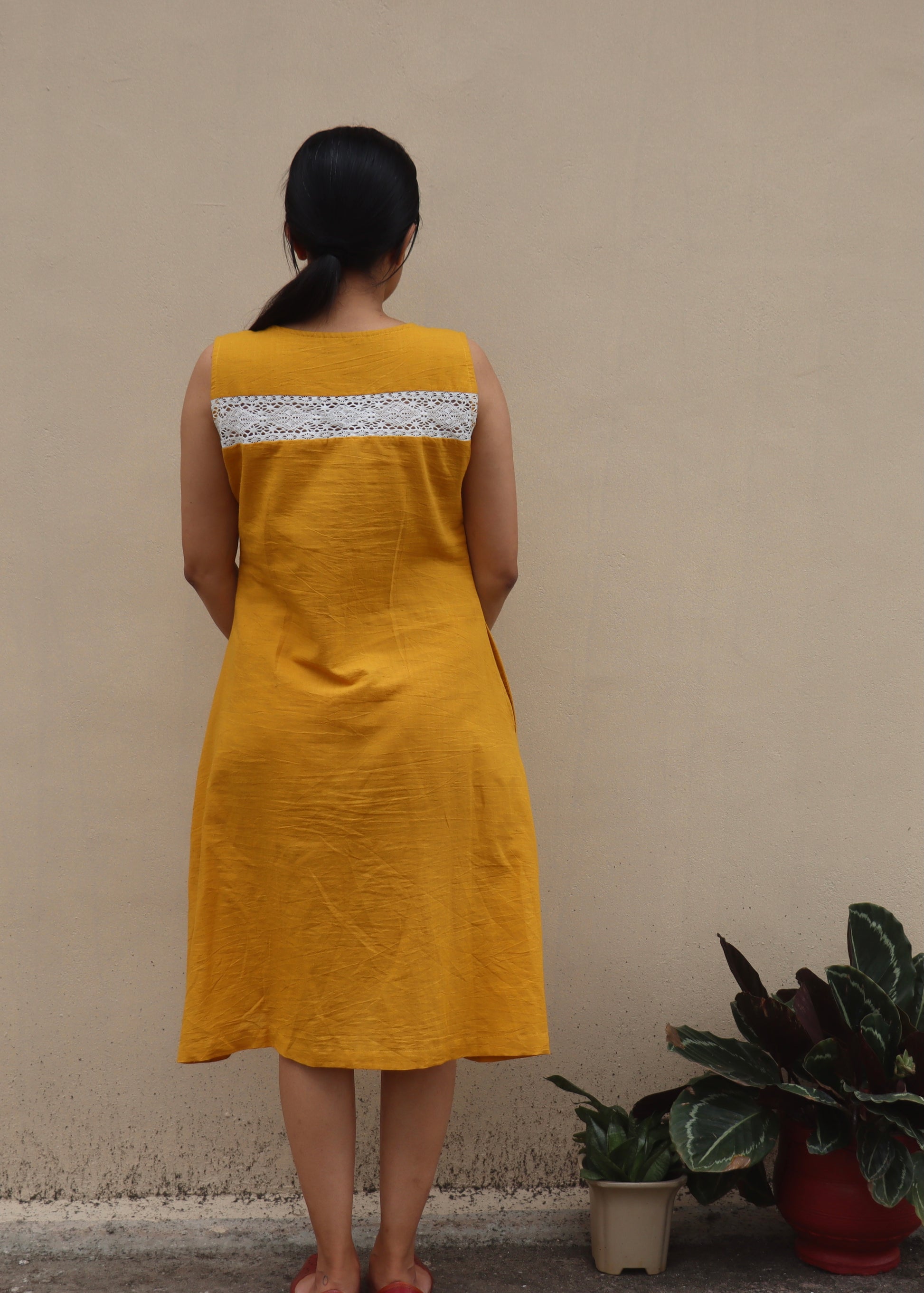 Buy pure khadi cotton dresses online. Our mustard yellow cotton dress with lace detailing is your go to dress this summer for comfort and style. Shop Now!
