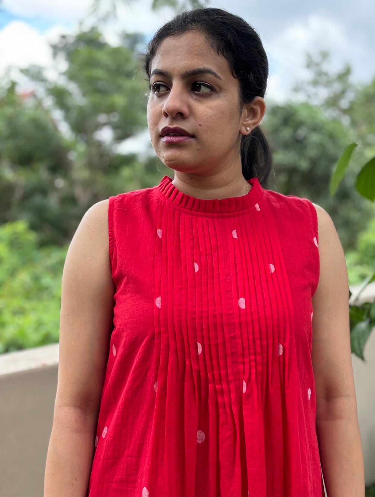 Discover our exquisite Jamdani dress. This red handwoven piece features intricate pintuck detailing. Experience the luxury of traditional Jamdani craftsmanship. Shop now