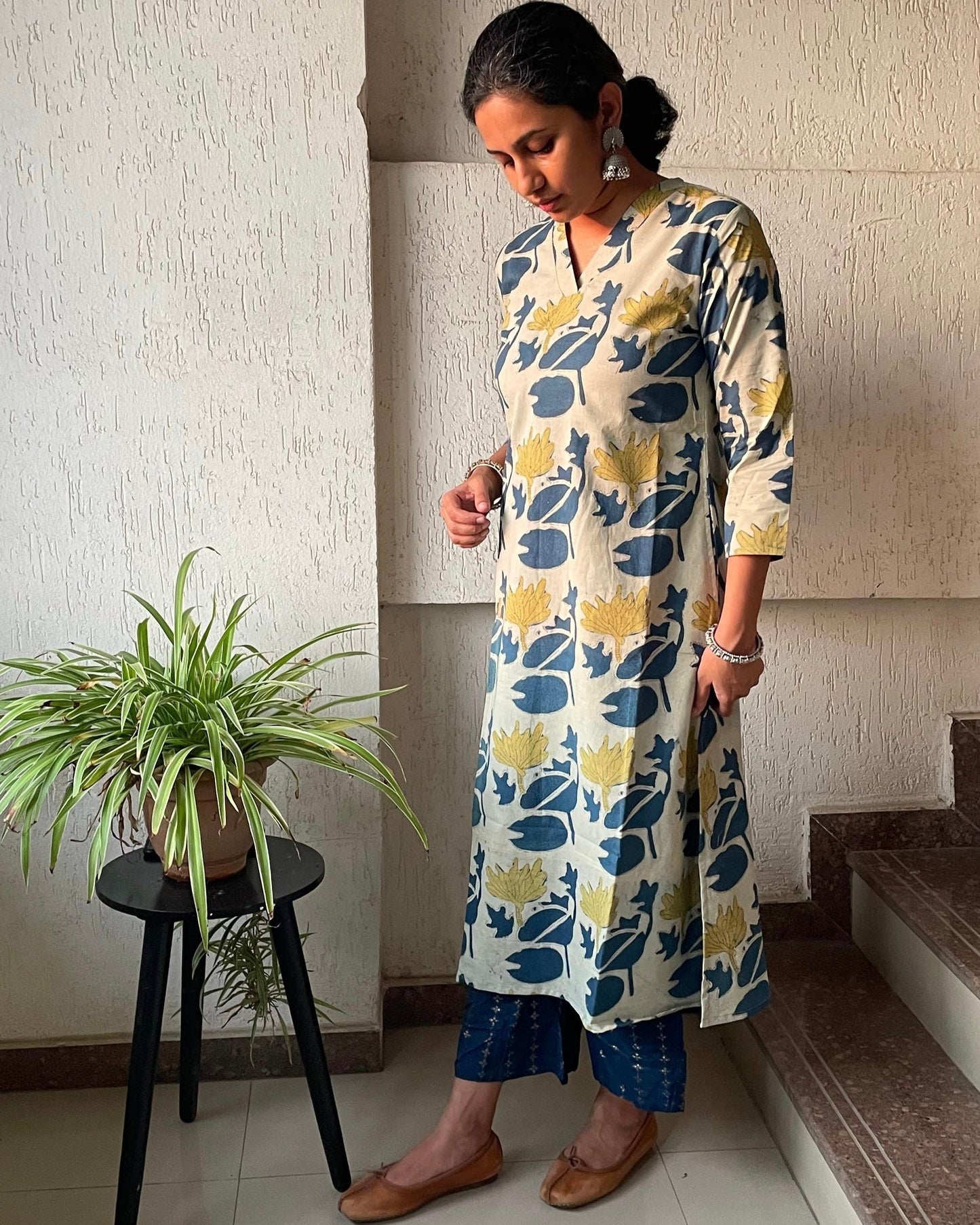 Shop authentic dabu print kurtas for women online. Dabu printed cotton kurta with collar V neck and sleeves. Pure cotton kurta.