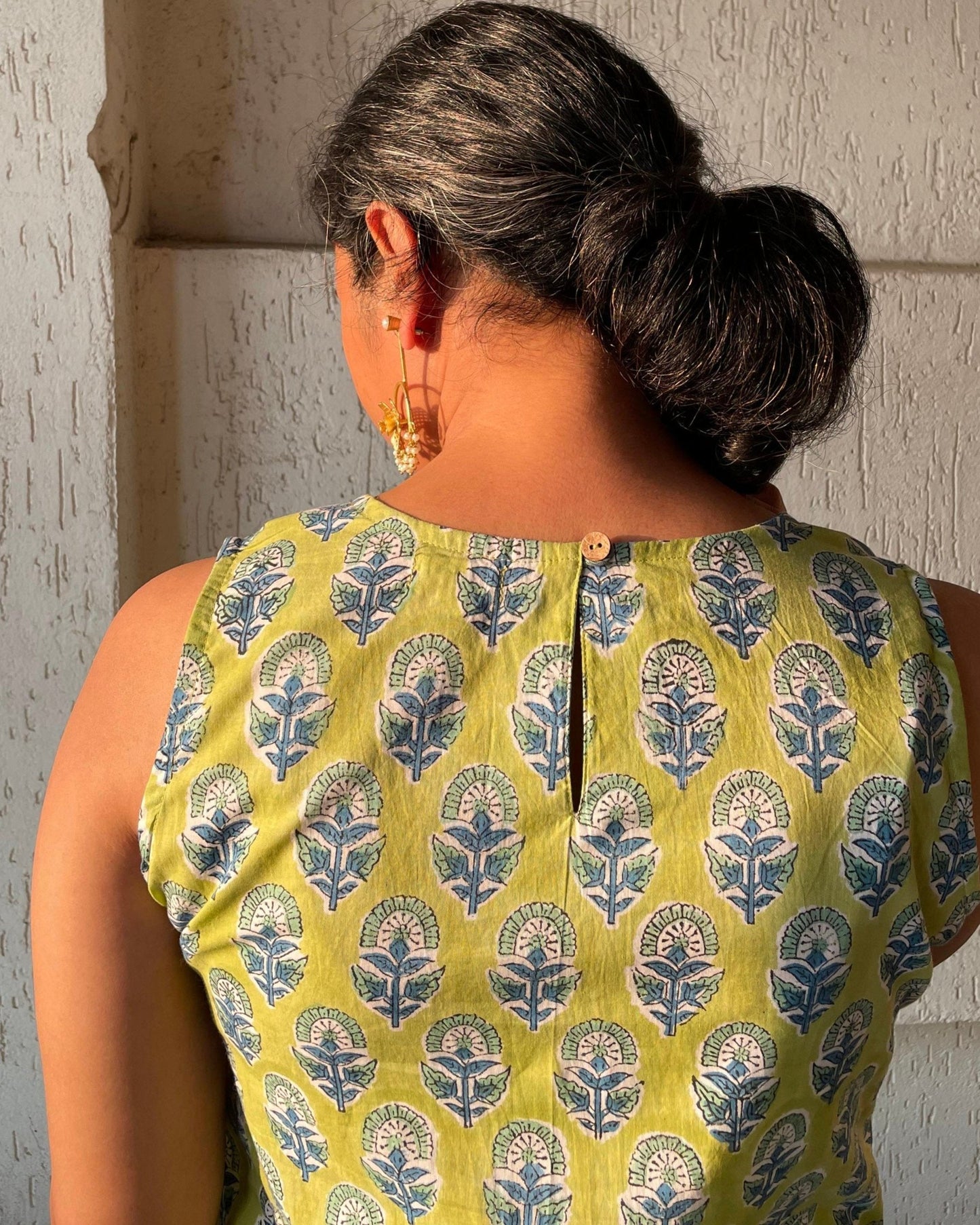 Shop our hand block printed sleeveless kurta for women in lemon yellow colour. Comfortable, chic, and perfect for everyday elegance.