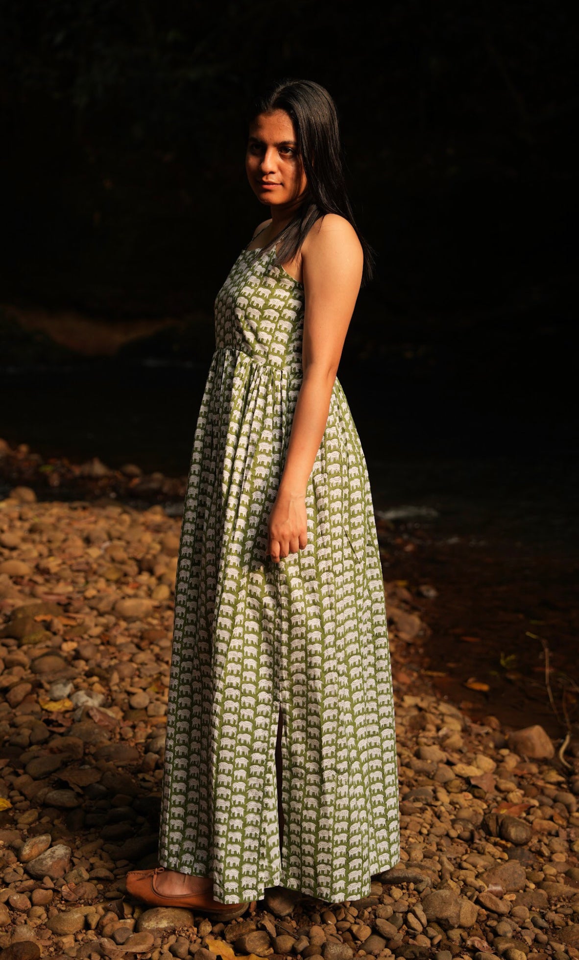 Enjoy elegance of our casual cotton maxi dress. Experience the beauty of hand-block prints and adjustable straps. Featuring a side slit and pocket for convenient, everyday comfort.
