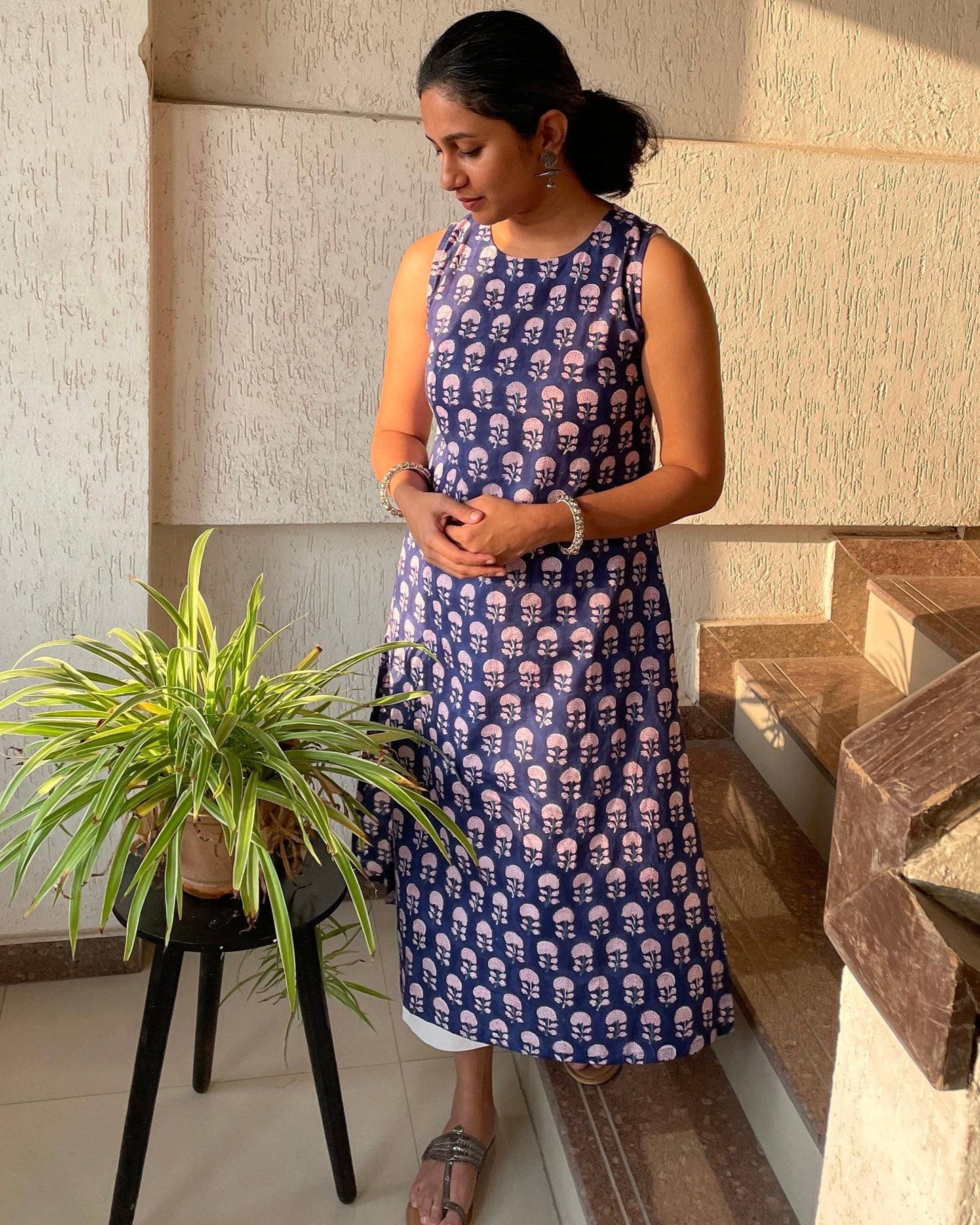 comfortable cotton kurtis for summer online. Shop our navy blue sleeveless hand block printed kurta for effortless summer style and breathable comfort.