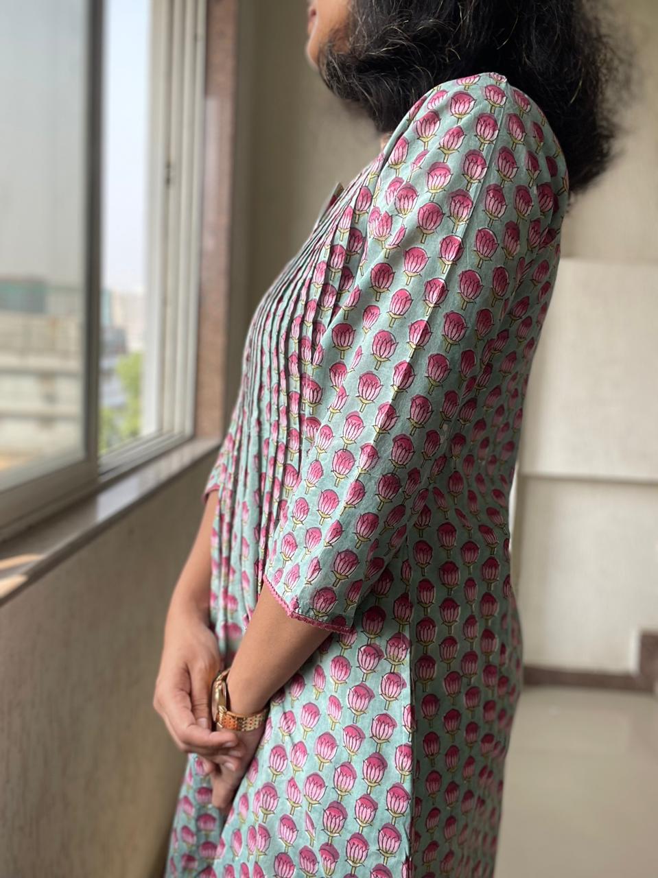 Authentic hand block printed cotton kurtis for summer online. Explore vibrant turquoise and pink designs, perfect for a stylish and comfortable summer wardrobe.