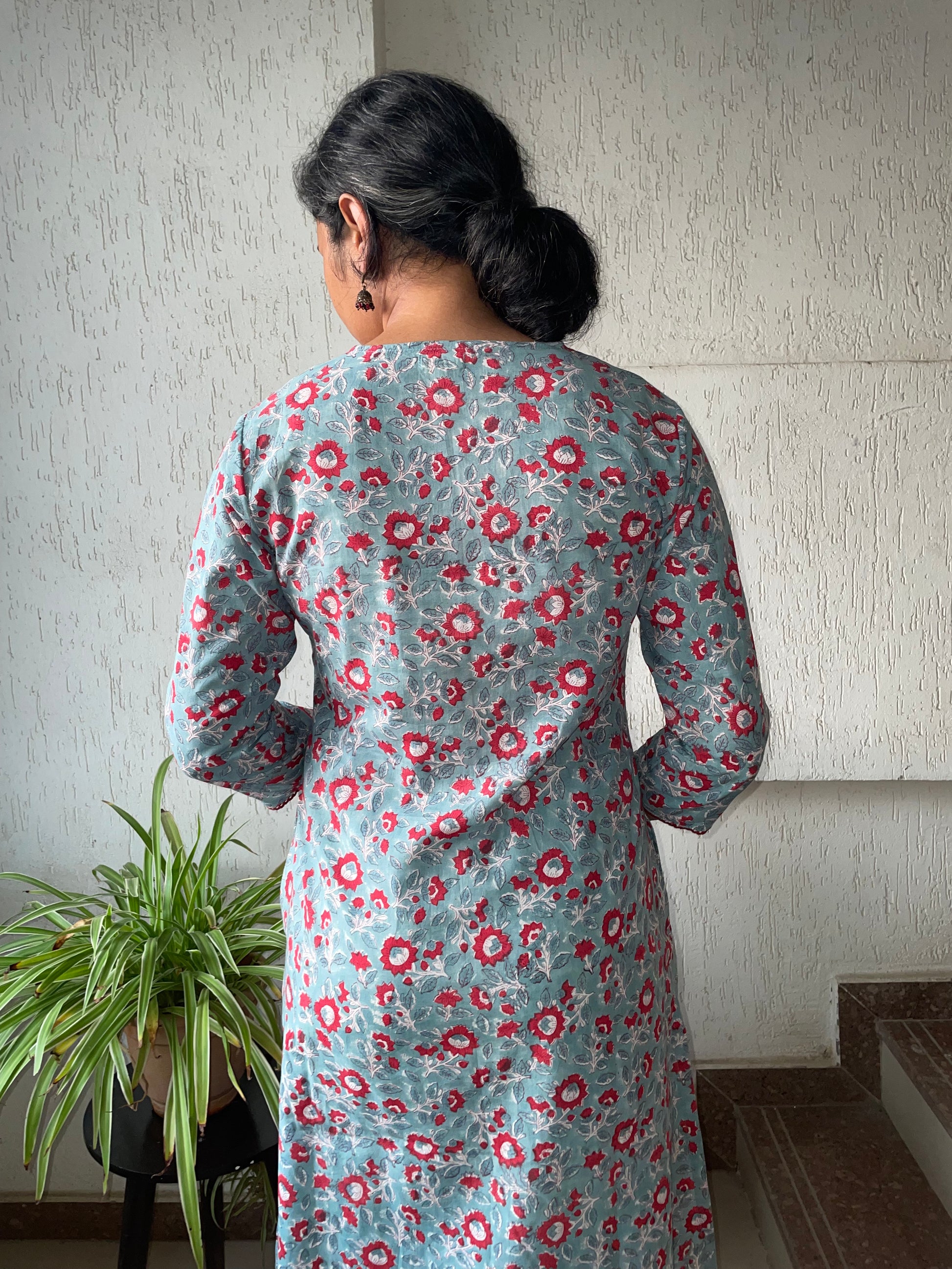 Find your perfect simple cotton long kurti online. Shop comfortable, hand block printed designs, including our stylish grey and red floral women's kurta.