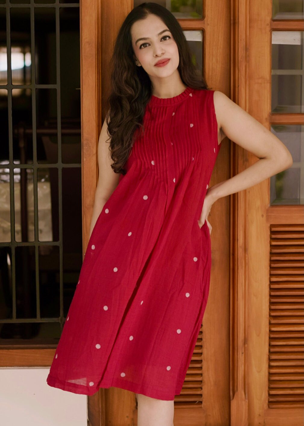 Discover our exquisite Jamdani dress. This red handwoven piece features intricate pintuck detailing. Experience the luxury of traditional Jamdani craftsmanship. Shop now