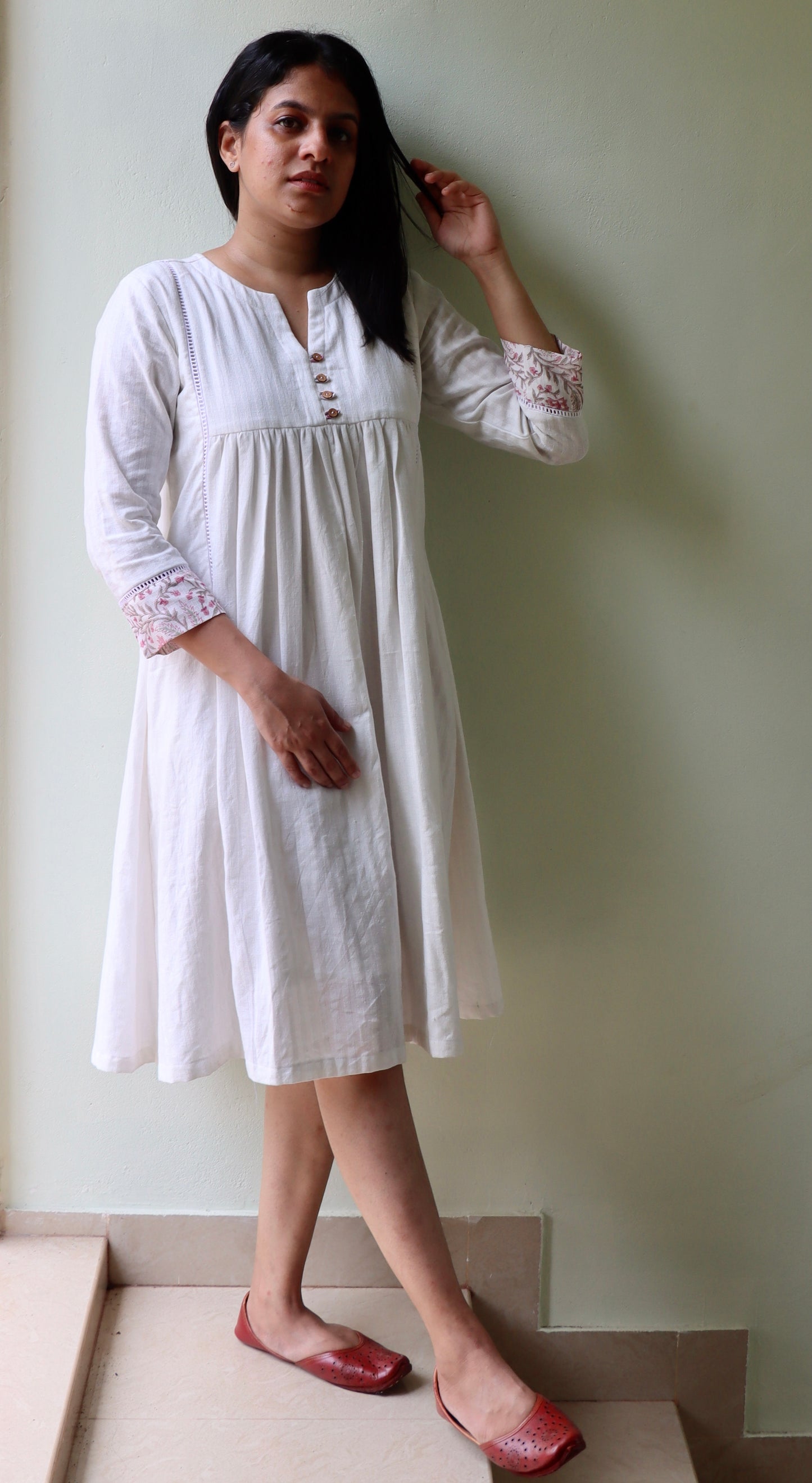 Buy authentic khadi cotton dresses handspun by artisans. This handwoven white khadi dress elevates your summer clothing into elegance. Check out our entire collection!